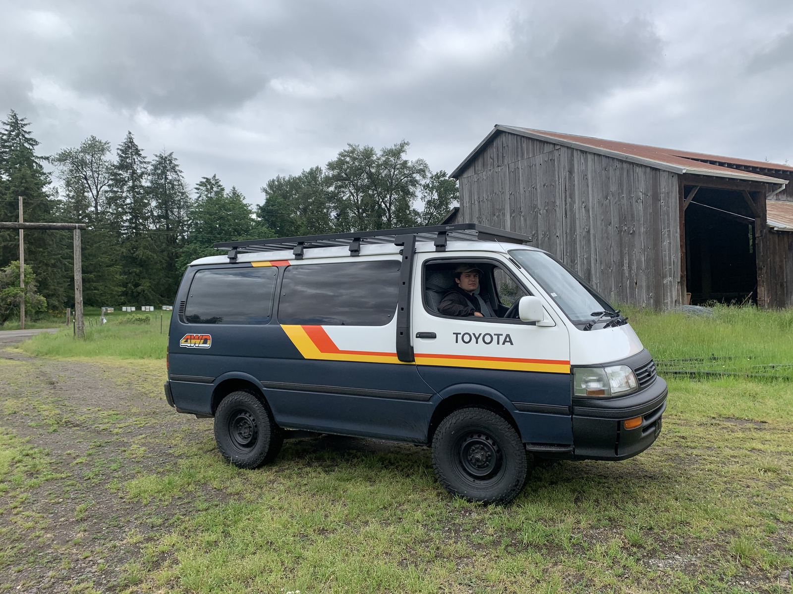 Navy Adventure Ace van at a farm