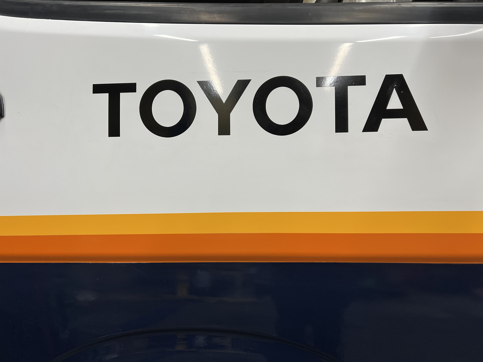 Adventure Ace stripe detail with Toyota badge